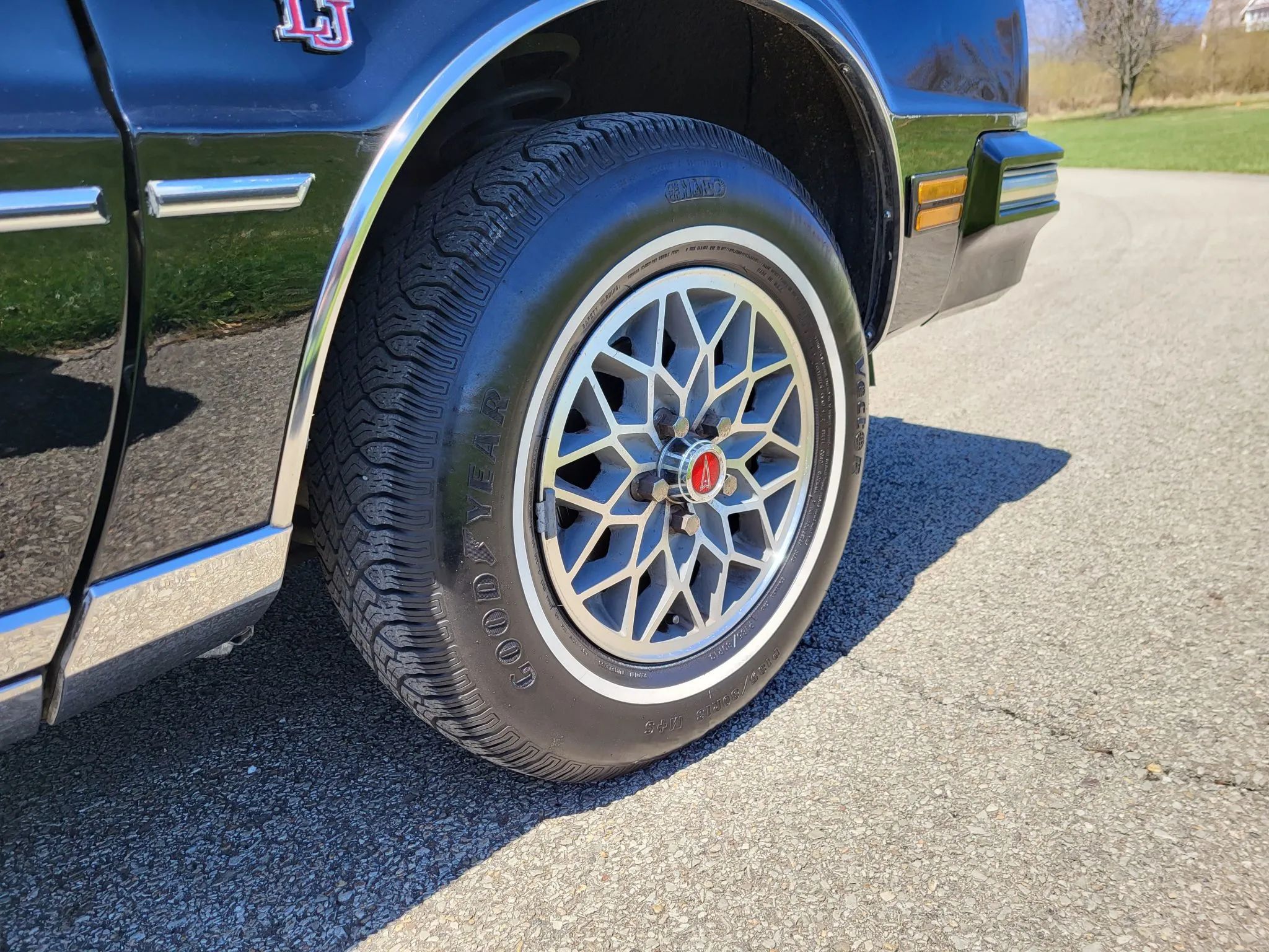 1980 Pontiac Phoenix LJ Coupe: Two Doors, Four Speeds, 32,349 Miles, Zero Credibility 21 Snowflake wheel on a 1980 Pontiac