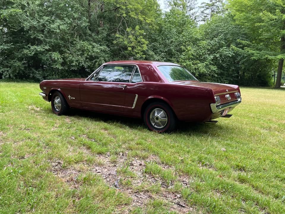 Driver rear three-quarter image of 1965 Ford t5 in burgundy