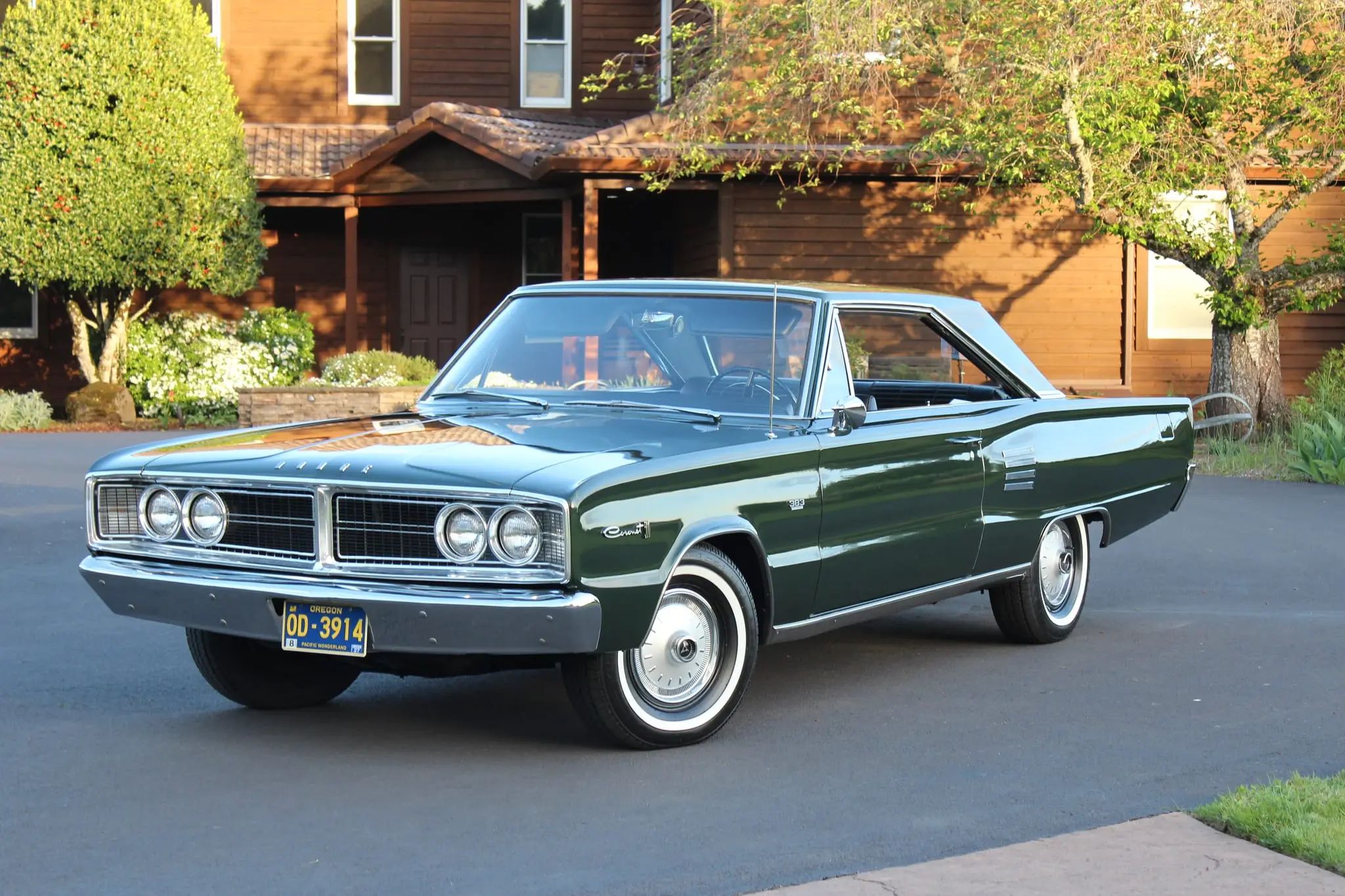 Driver front three-quarter view of dark green 1966 Dodge Coronet for sale
