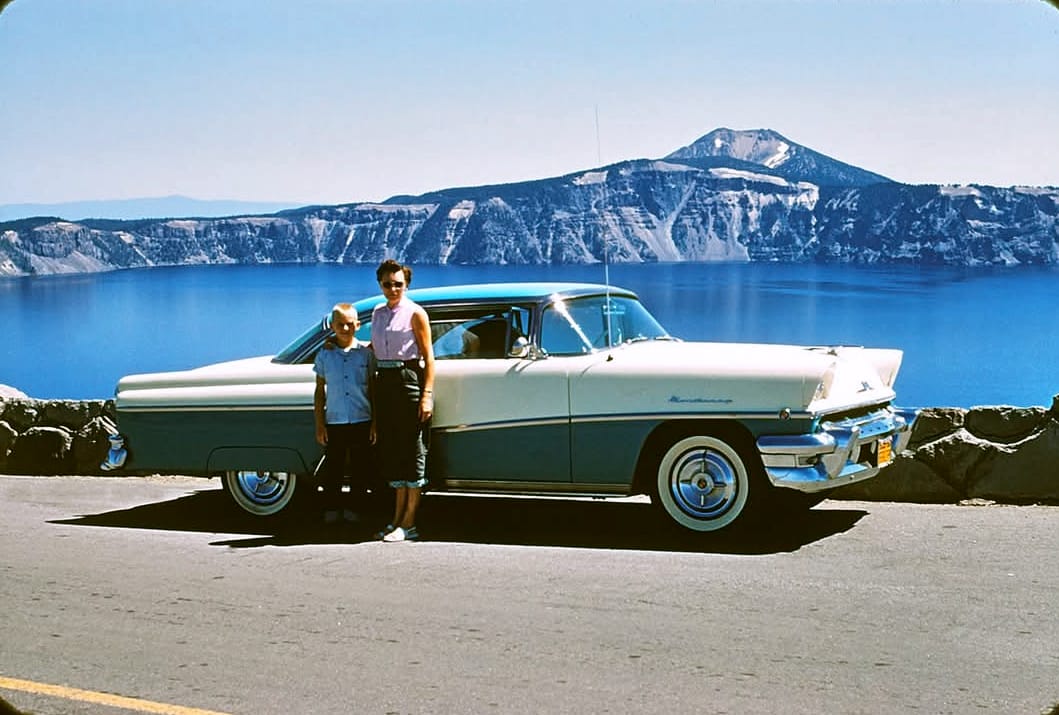 a 1956 Mercury Monterey coupe in two-tone treatment, and Crater Lake, Oregon