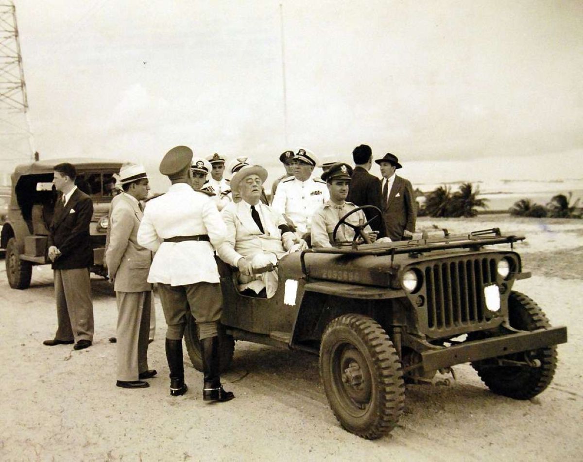 president franklin roosevelt rides in a jeep in natal brazil