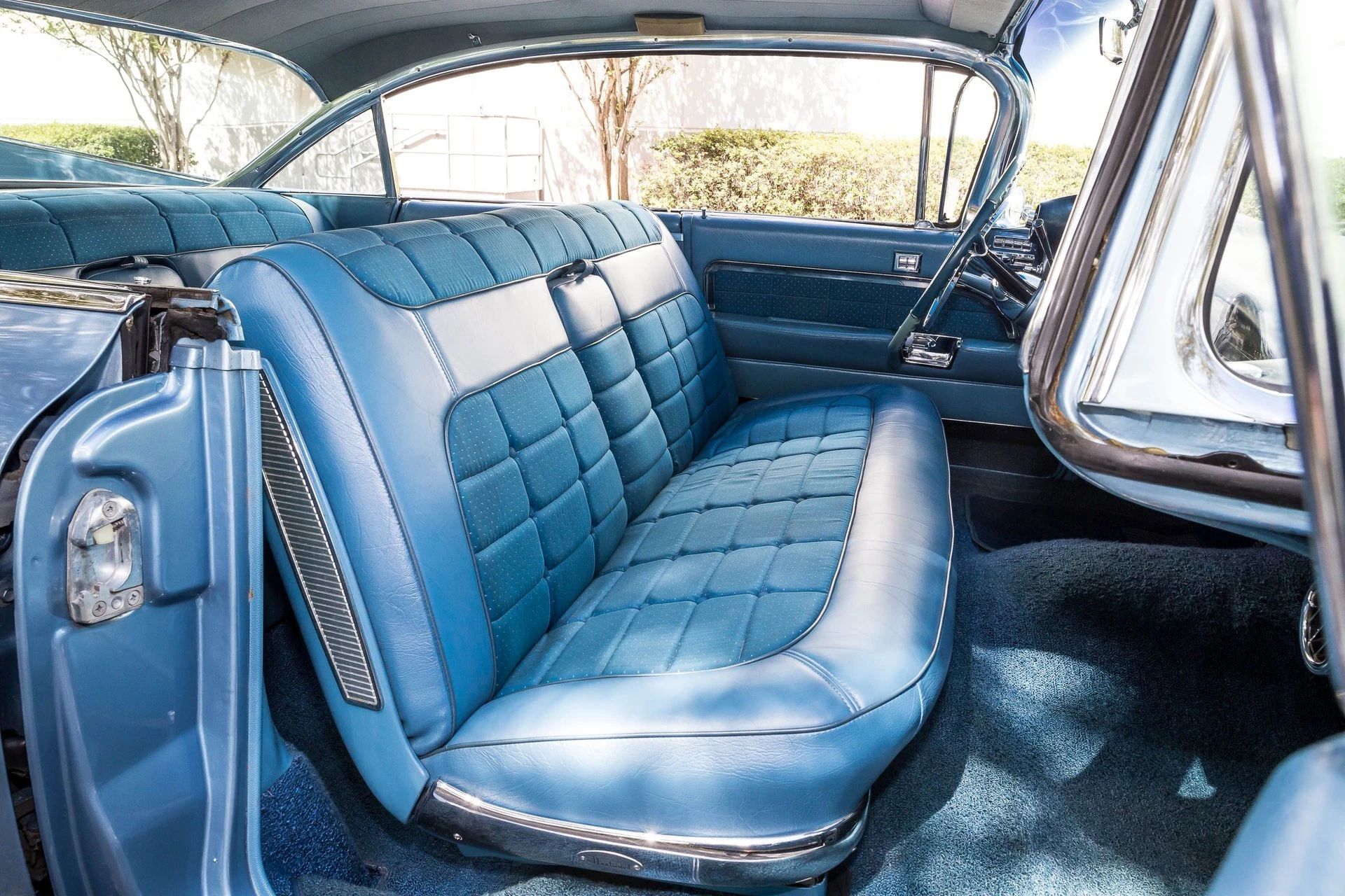 From Flattop To Formal: Cadillac's 1959–1964 Four-Window And Six-Window Four-Door Hardtops 12 Front seat of a 1959 Cadillac six-window four-door hardtop, showing the glass area on the left side
