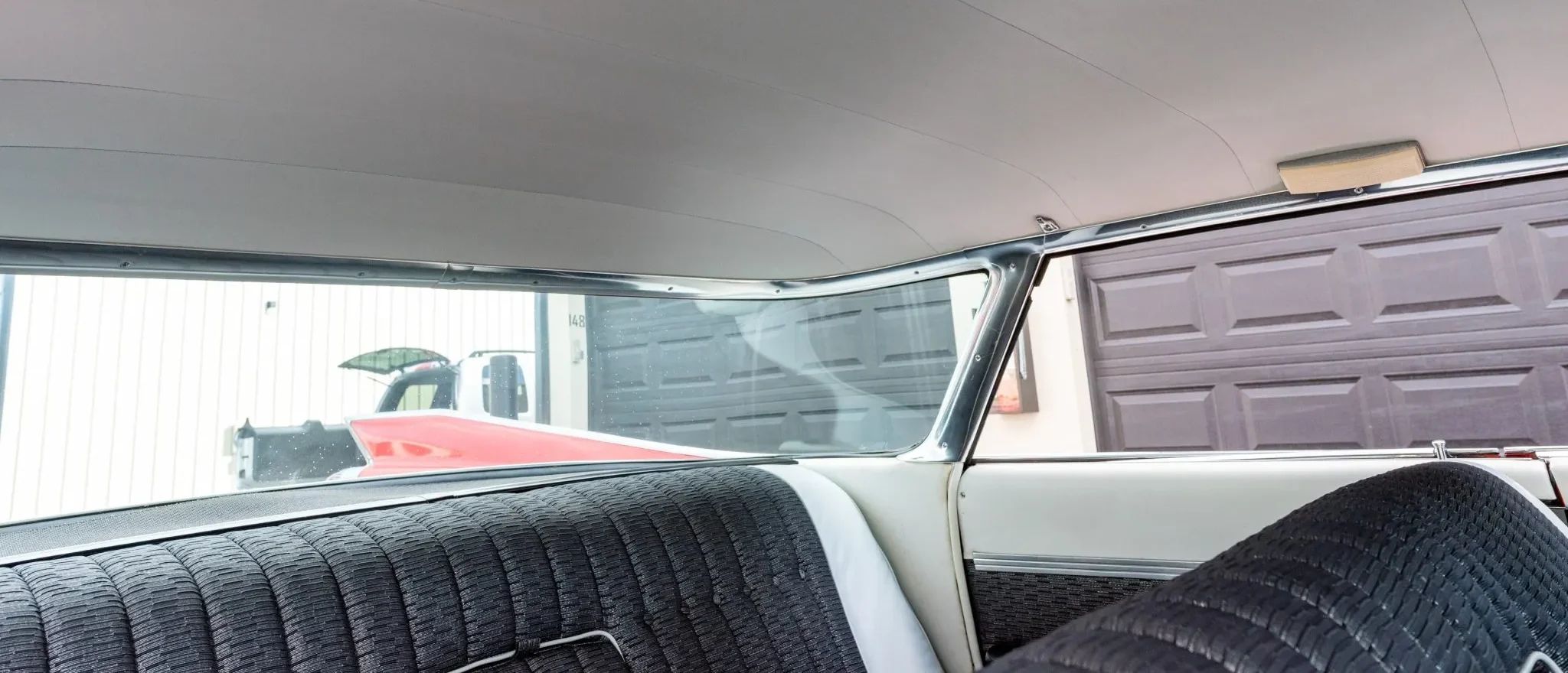 From Flattop To Formal: Cadillac's 1959–1964 Four-Window And Six-Window Four-Door Hardtops 8 Backlight of a 1959 Cadillac four-door hardtop, looking to the left rear