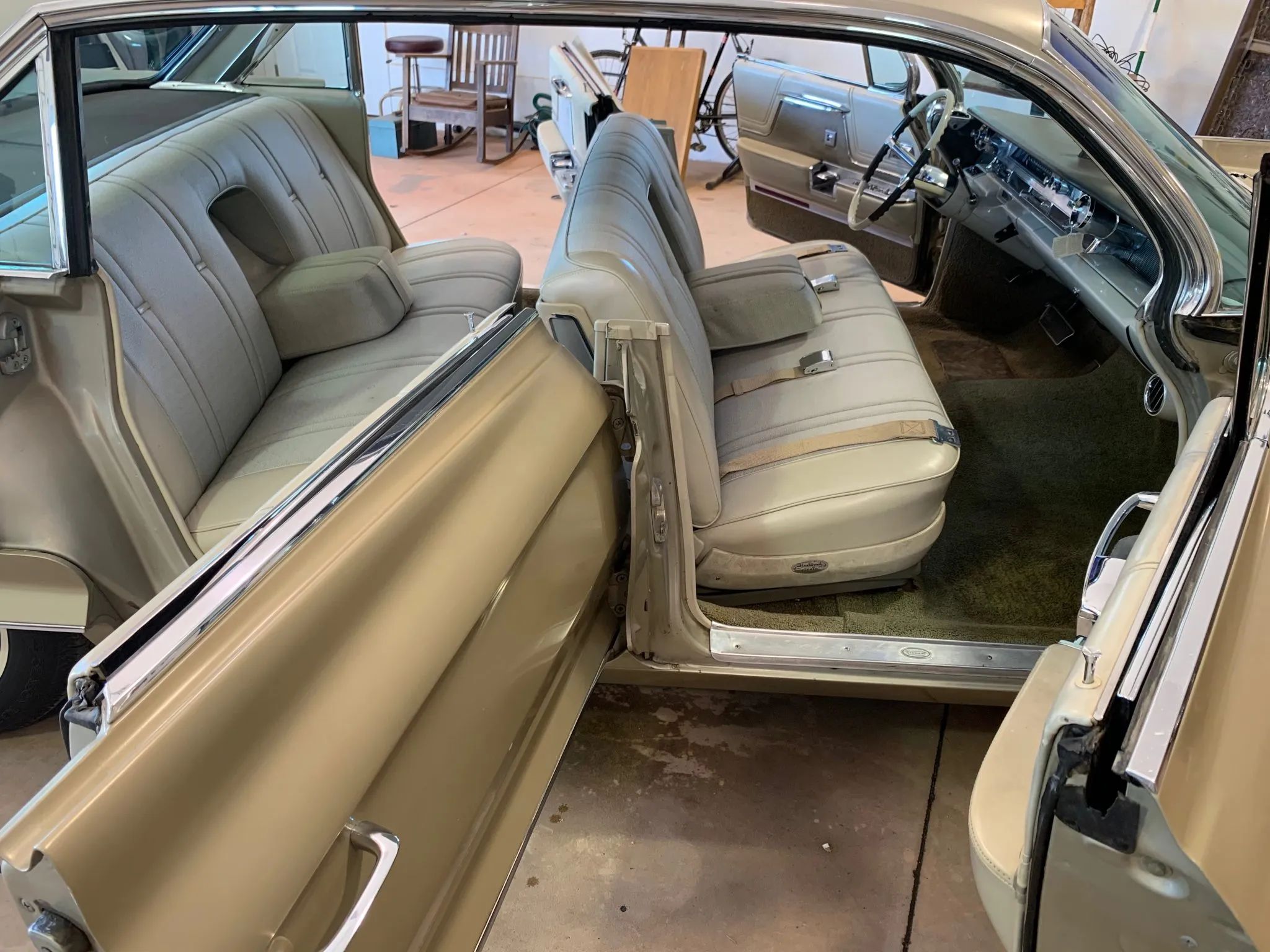 From Flattop To Formal: Cadillac's 1959–1964 Four-Window And Six-Window Four-Door Hardtops 34 Interior of a 1962 Cadillac six-window four-door hardtop with all the doors open and windows down