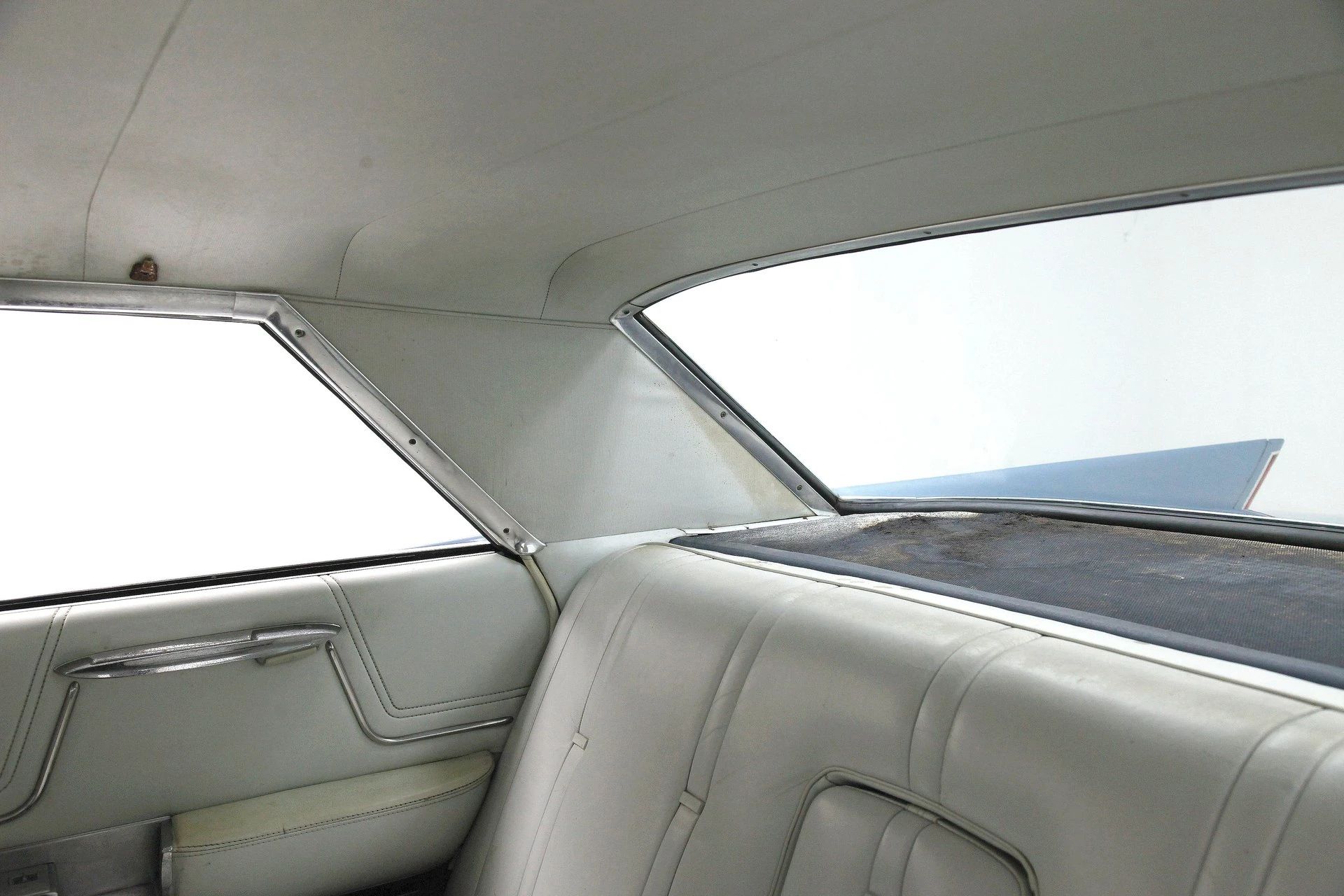 From Flattop To Formal: Cadillac's 1959–1964 Four-Window And Six-Window Four-Door Hardtops 30 Right rear sail panel of a 1962 Cadillac four-window four-door hardtop, seen from inside