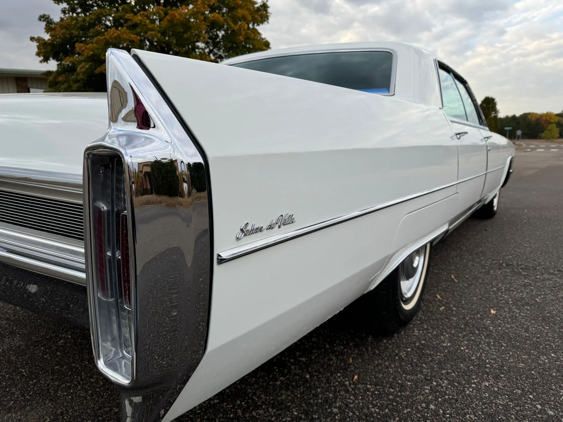 Low-angle shot of the right rear fender of a 1965 Cadillac four-door hardtop