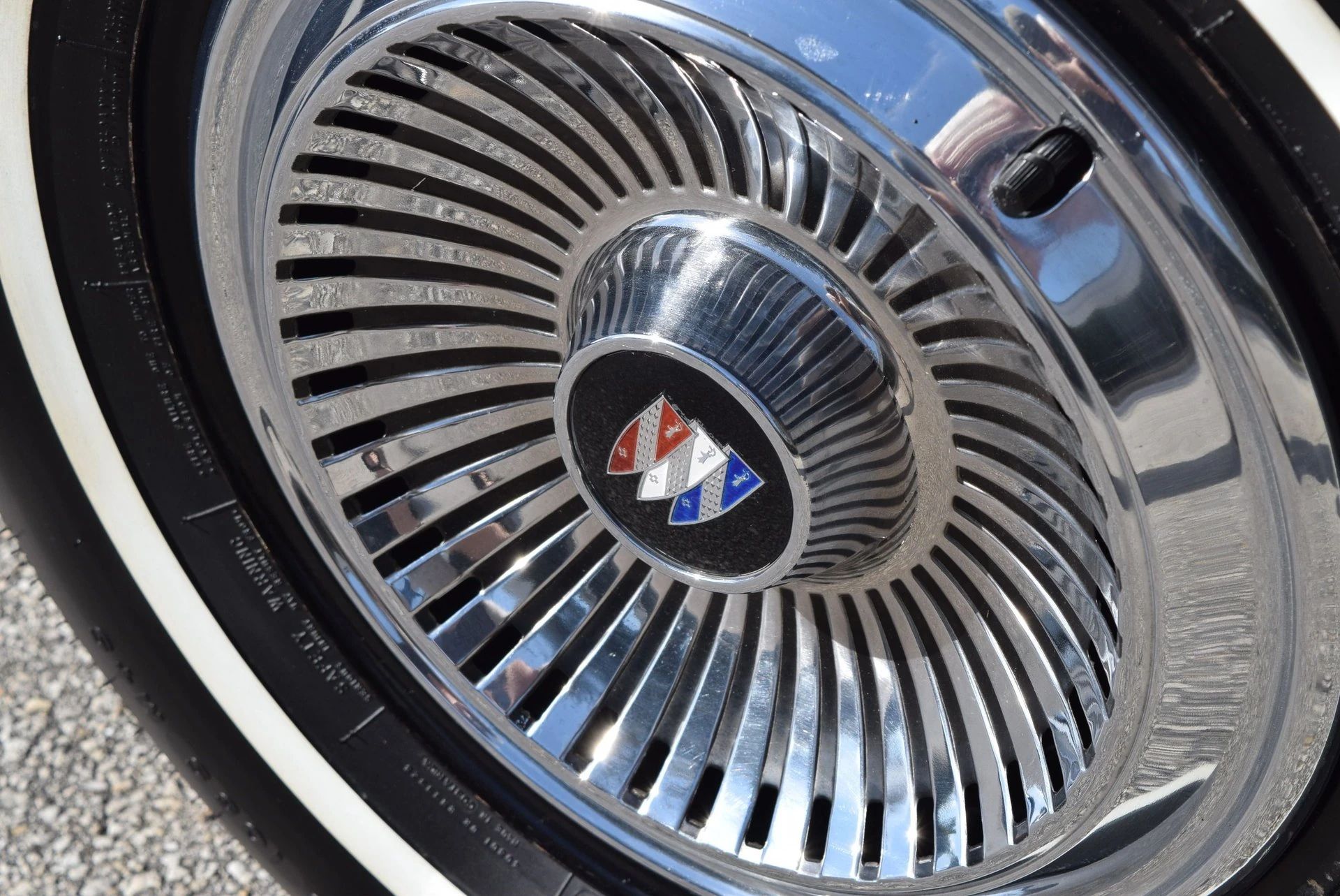 Closeup of a Buick wheel cover