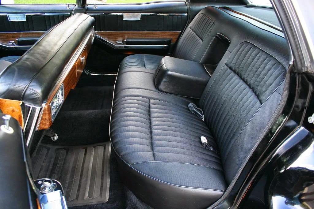 1966 Oldsmobile Ninety-Eight Town Sedan: GM's Cheapest C-Body Luxury Car 11 Rear bench seat with armrest in the back of a 1966 Oldsmobile, seen from the left