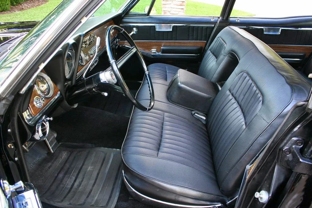 1966 Oldsmobile Ninety-Eight Town Sedan: GM's Cheapest C-Body Luxury Car 9 Front bench seat with center armrest in a 1966 Oldsmobile, seen from the left