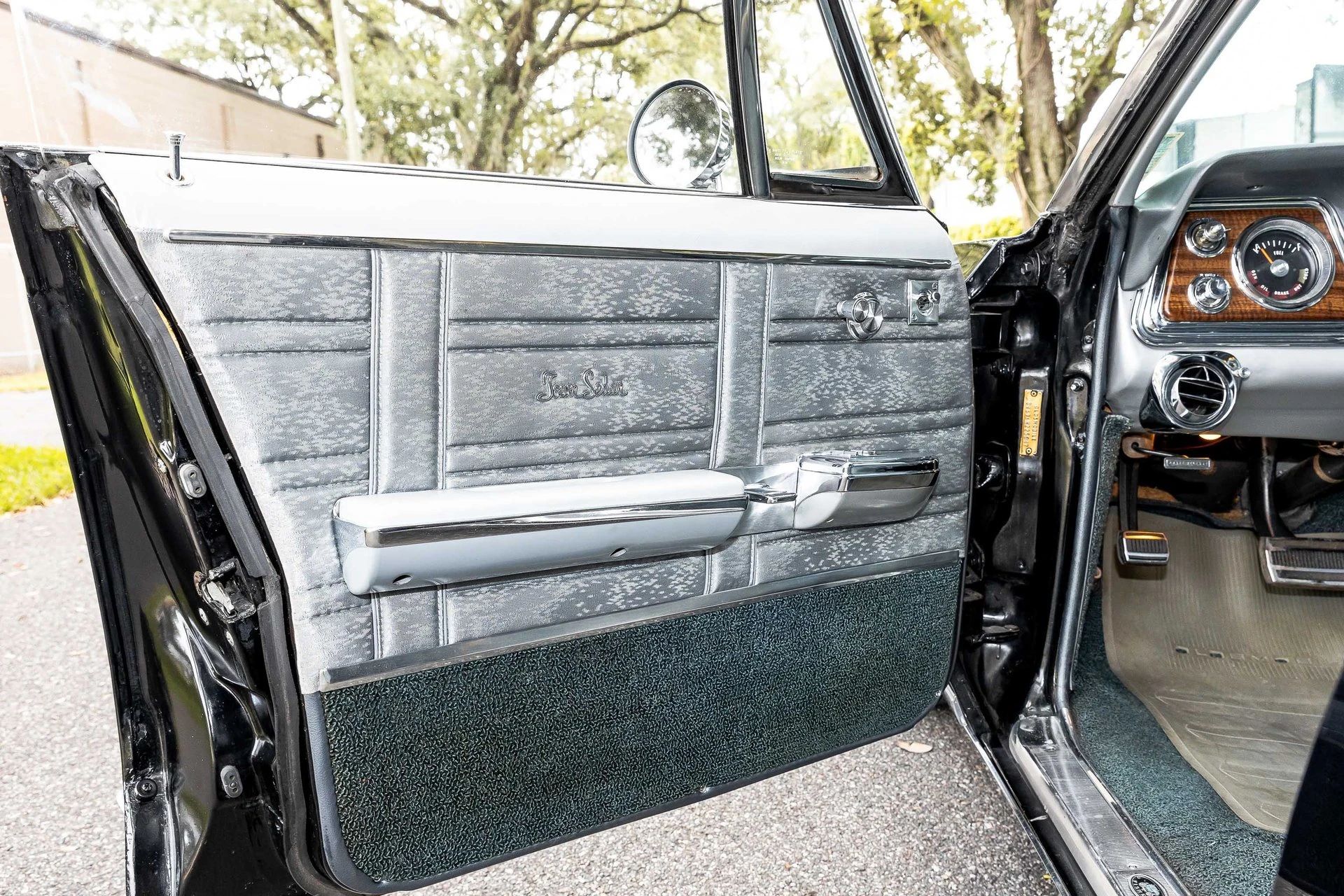 1966 Oldsmobile Ninety-Eight Town Sedan: GM's Cheapest C-Body Luxury Car 7 Door trim of a 1966 Oldsmobile with "Town Sedan" embroidered lettering