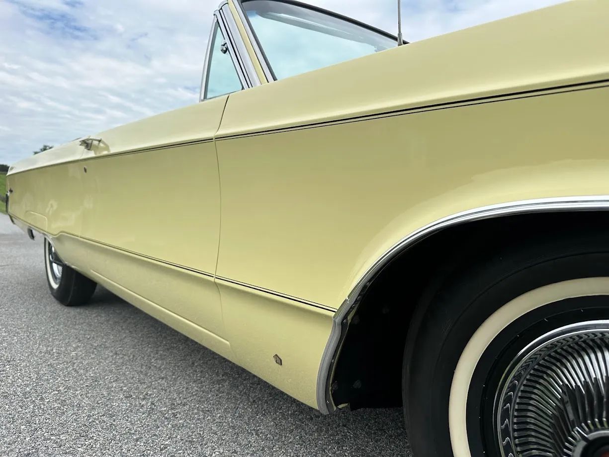 Closeup of the right body side creases on a 1967 Chrysler convertible