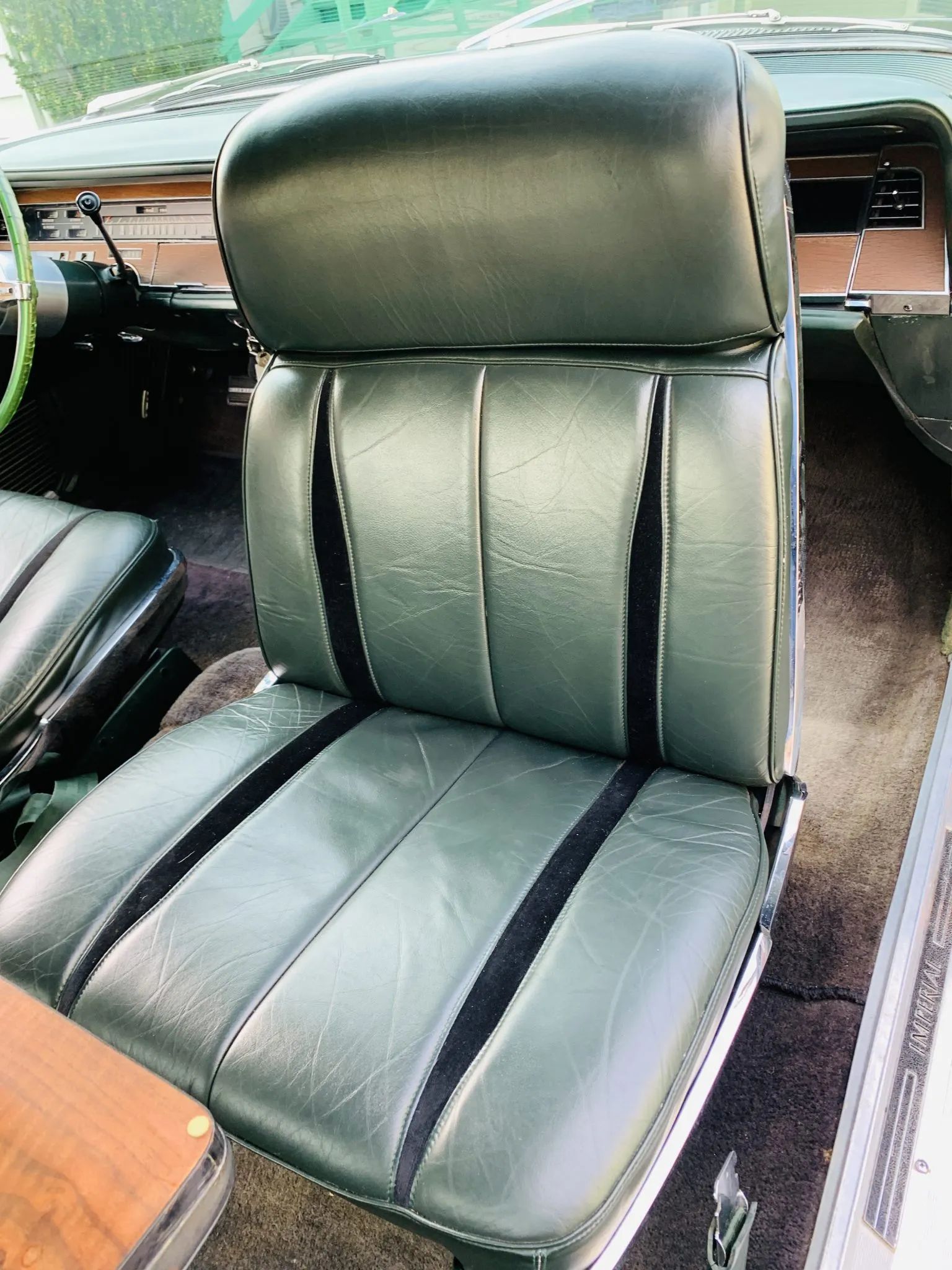Swiveling right front bucket seat of a 1967 Imperial two-door hardtop, turned to face the rear