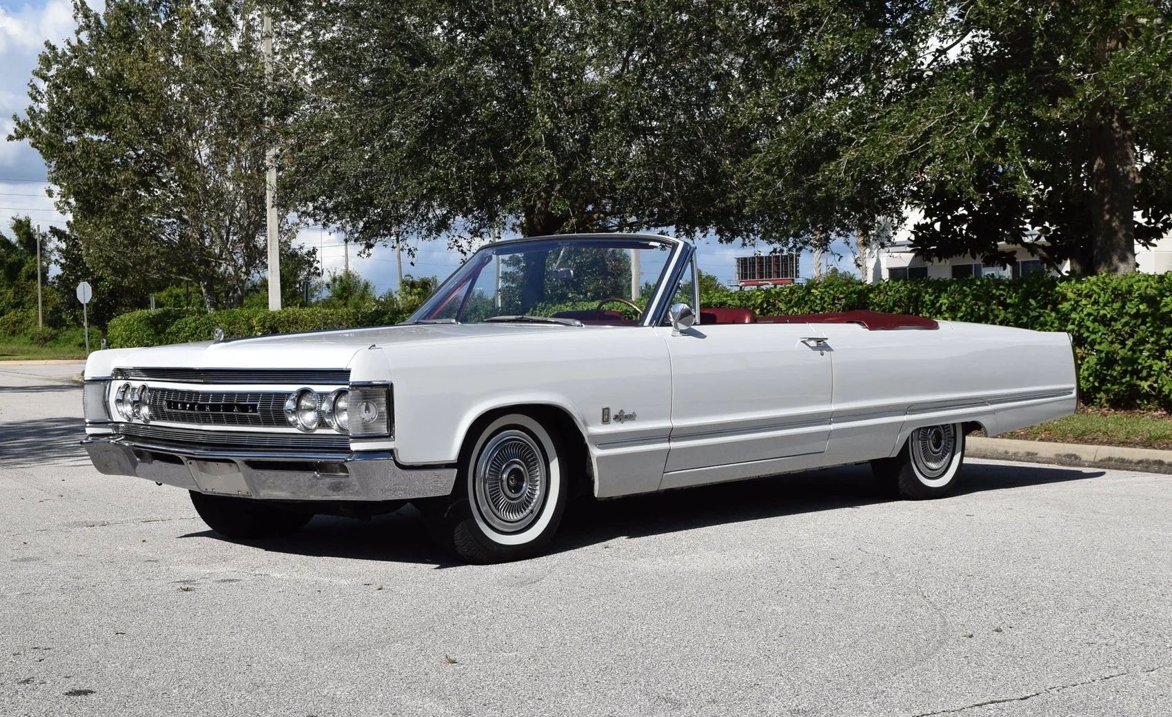 Left front 3q view of a white 1967 Imperial Crown Convertible with its top down
