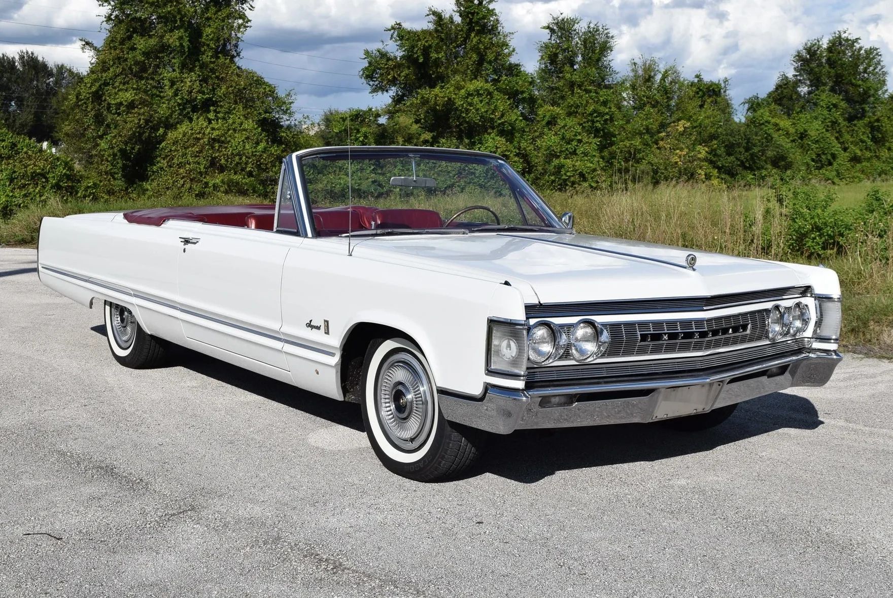 Right front 3q view of a 1967 Imperial with its top down