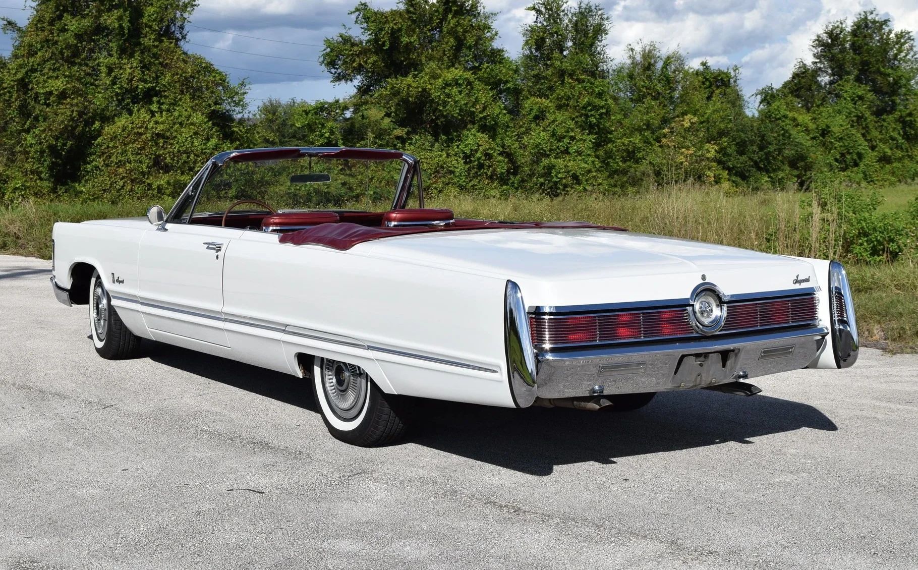 Left rear 3q view of a 1967 Imperial convertible with its top down
