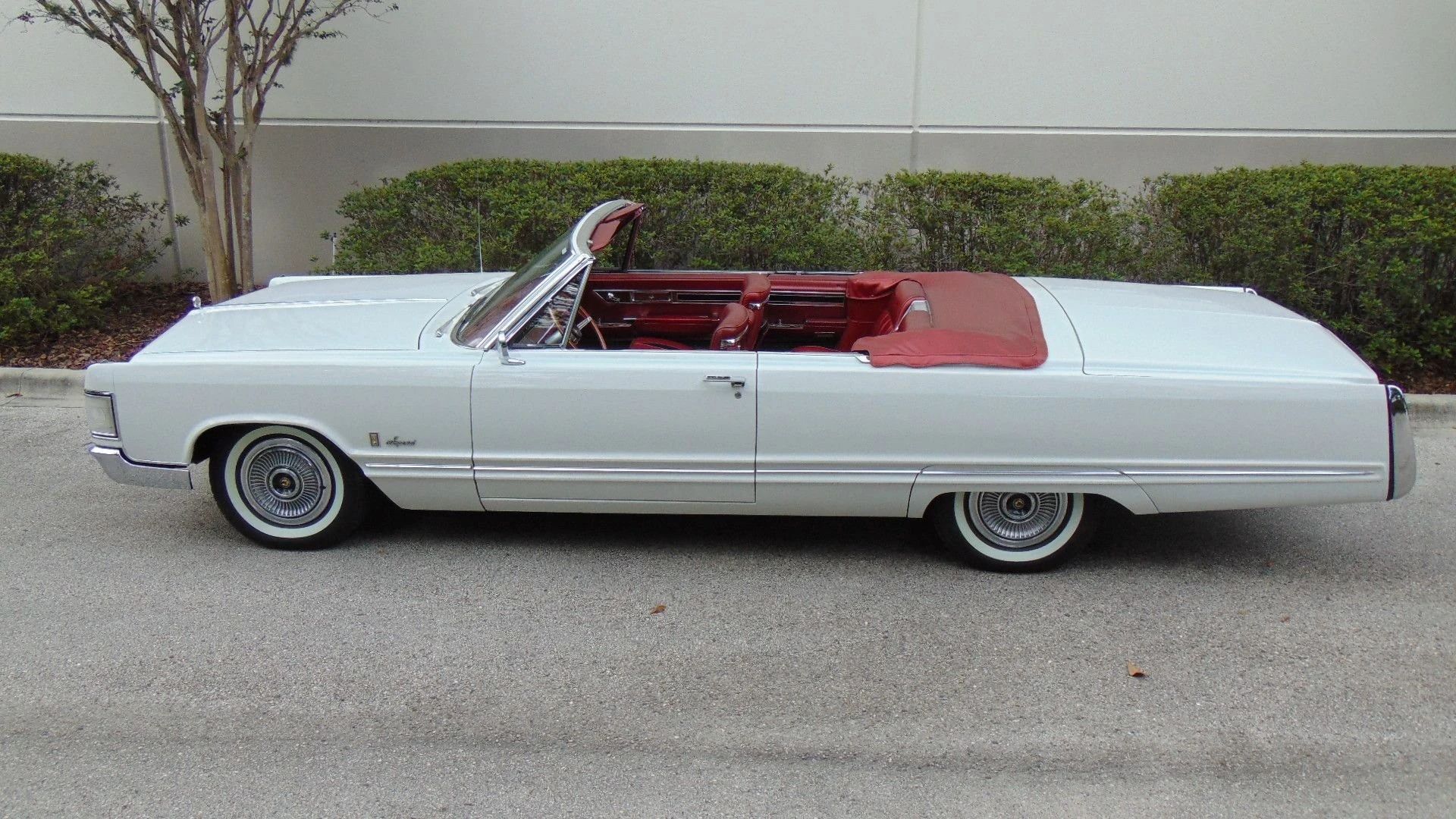 Left side view of a 1967 Imperial convertible with the top down
