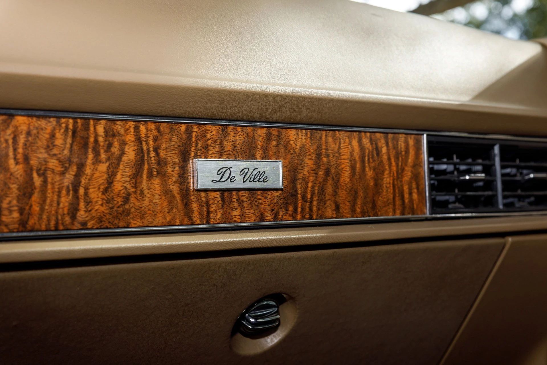 1970 Cadillac De Ville Convertible: The Very Last Full-Size Cadillac Convertible Ever Built 2 De Ville badge on the right side of the dashboard of a 1970 Cadillac