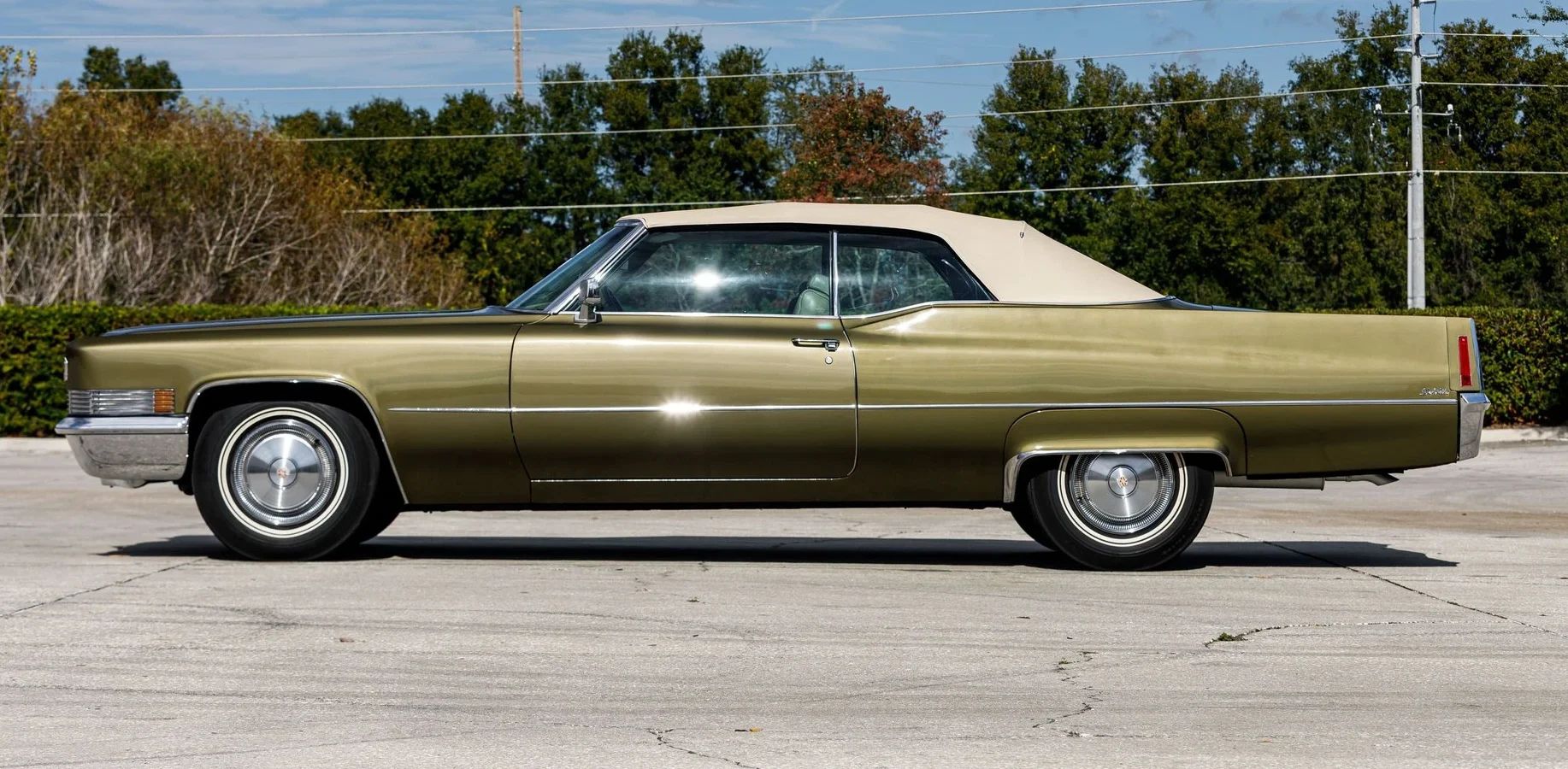1970 Cadillac De Ville Convertible: The Very Last Full-Size Cadillac Convertible Ever Built 18 Left side view of a 1970 Cadillac convertible with the top up