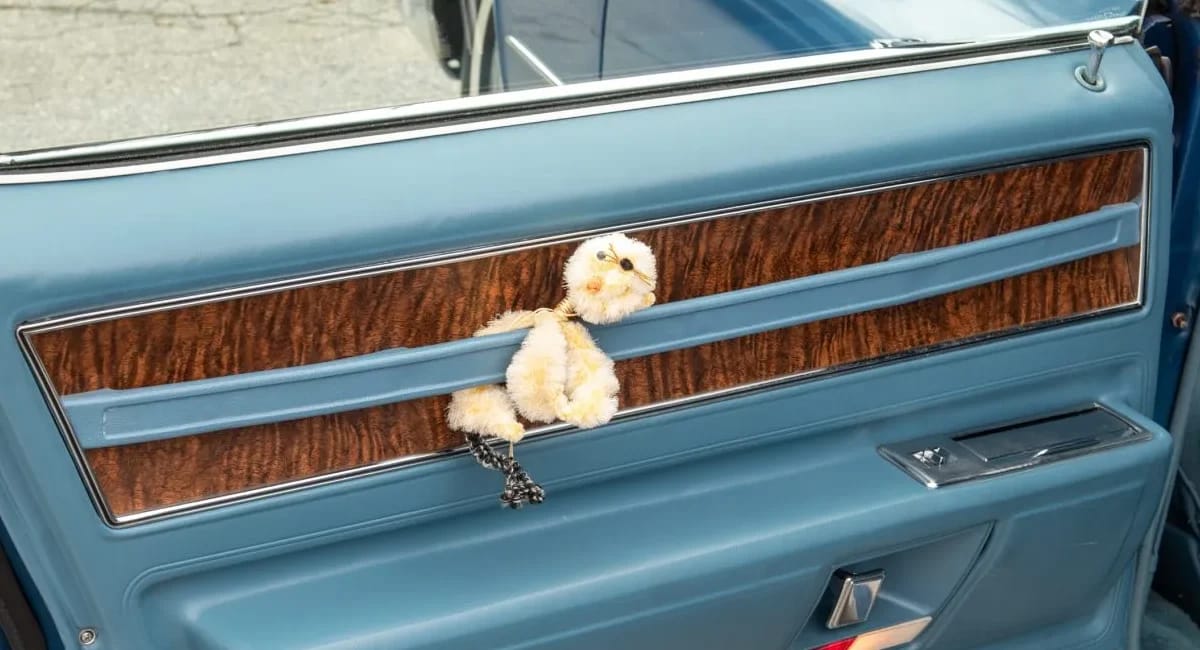 1970 Cadillac Fleetwood Sixty Special: A Chauffeur-Driven Example Of The Rare Final RWD Sixty Special 7 Left rear door of a 1970 Cadillac Fleetwood sedan with a stuffed toy tucked under the door pull