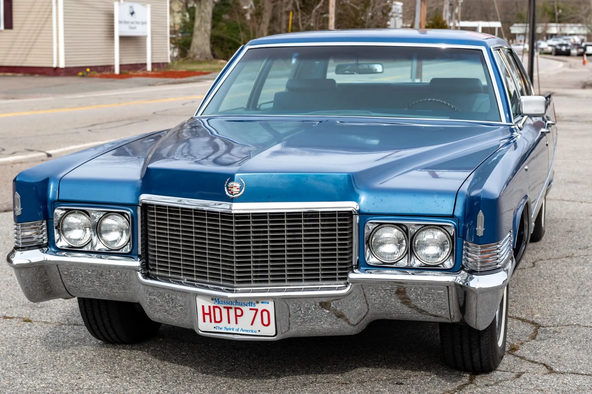1970 Cadillac Fleetwood Sixty Special: A Chauffeur-Driven Example Of The Rare Final RWD Sixty Special 3 Left front view of a 1970 Cadillac with a Massachusetts vanity plate reading "HDTP 70"