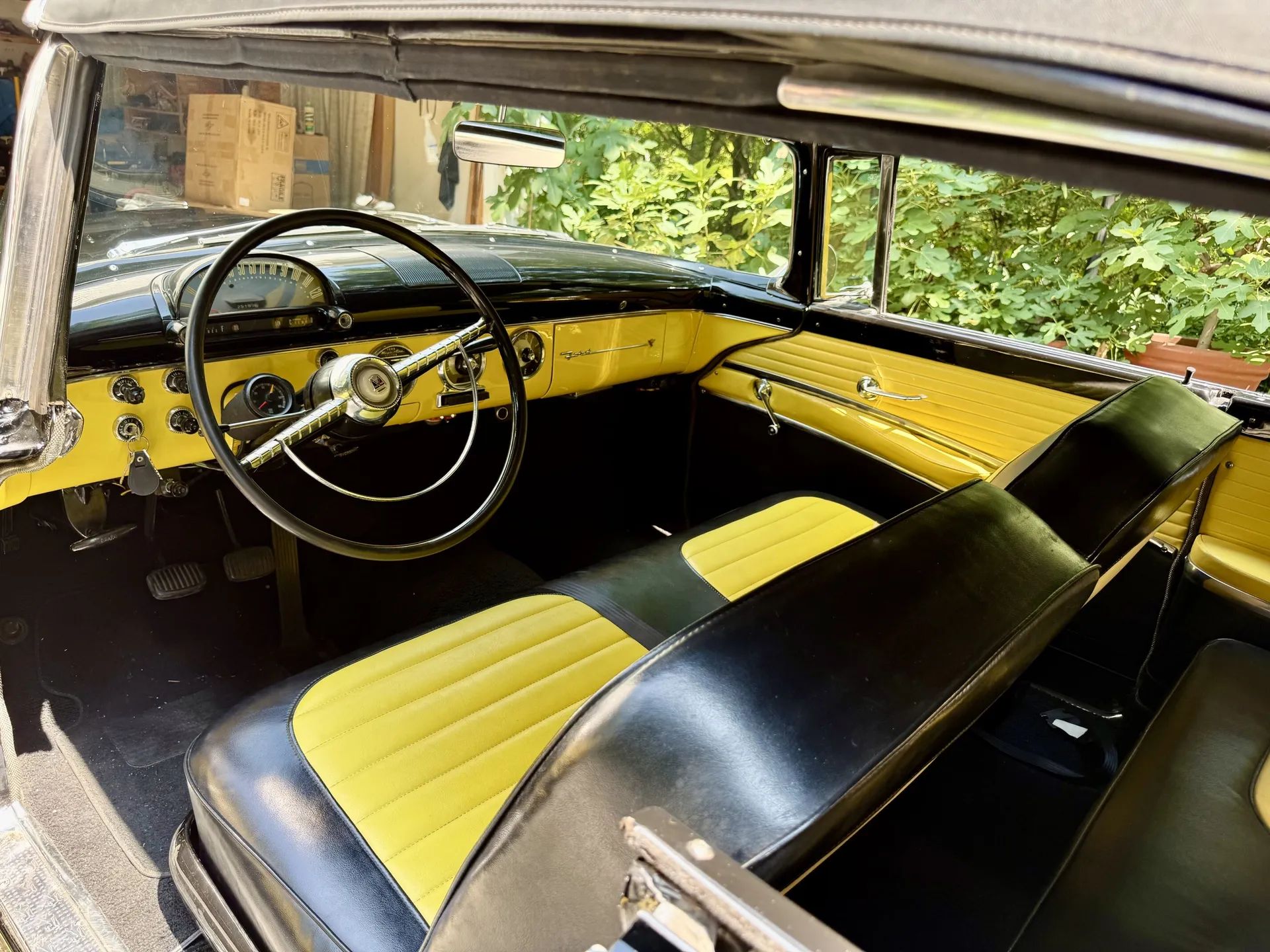Yellow and black interior of 1955 Ford Fairlane Sunliner