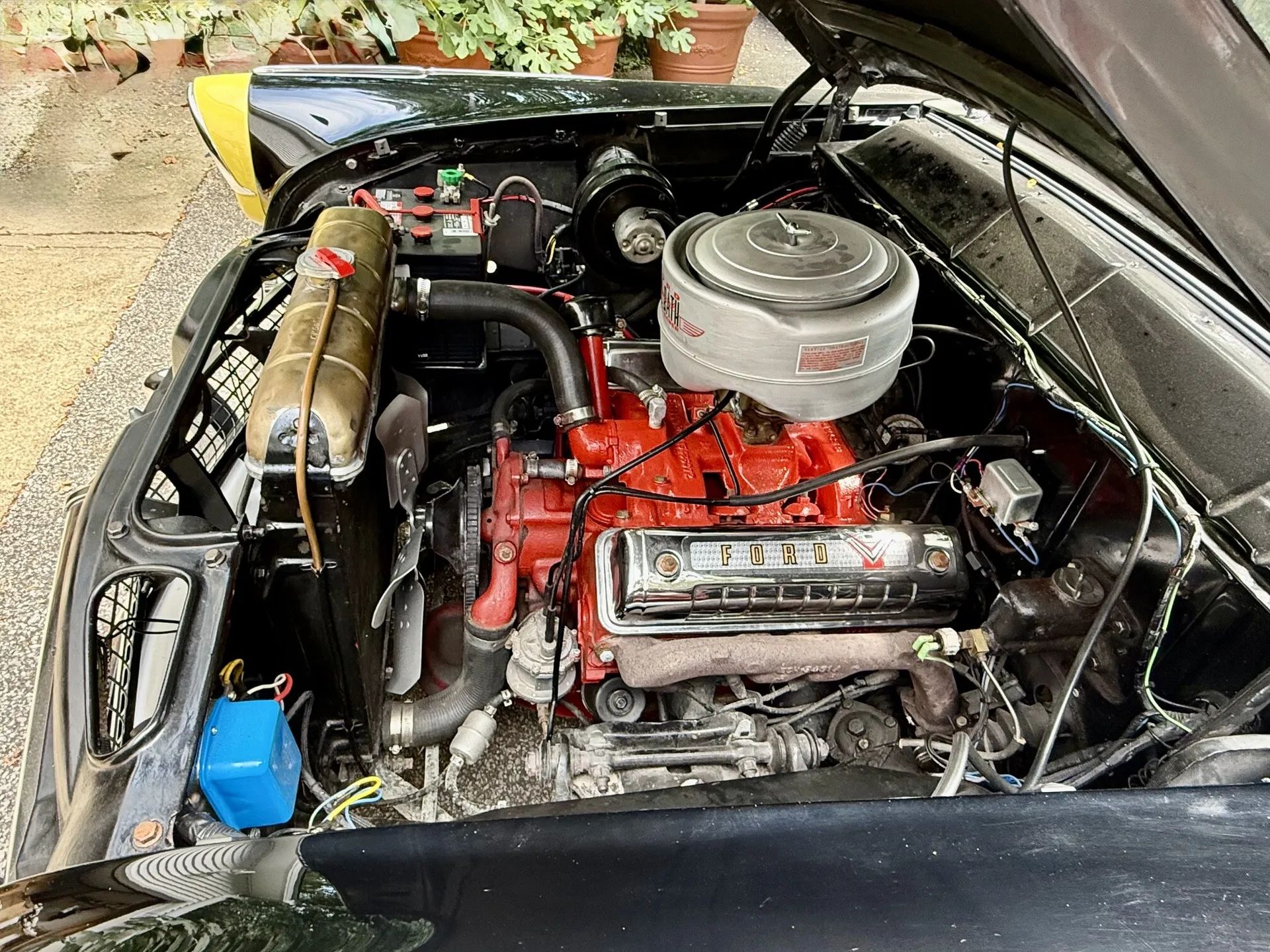 Engine compartment of 1955 Ford Sunliner with 272 V8 engine