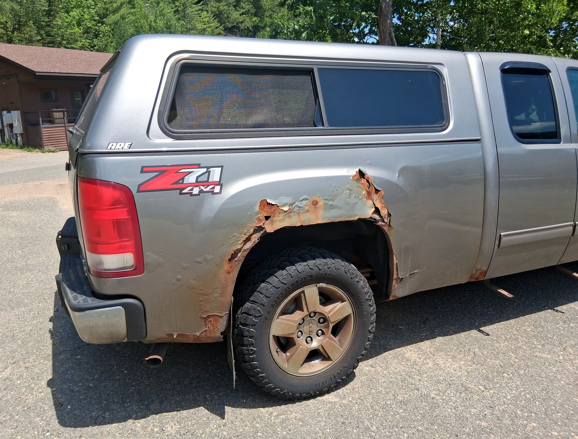 Curbside Find: A GMC Sierra, One Giant Rust Hole, and a Lot of Questions 3 55371148550 7c99f88f41 k