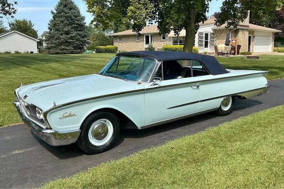 Driver front 3q view of light blue 1960 Ford Sunliner Convertible