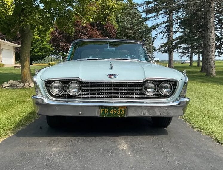 Front view of light blue 1960 Ford Sunliner Convertible