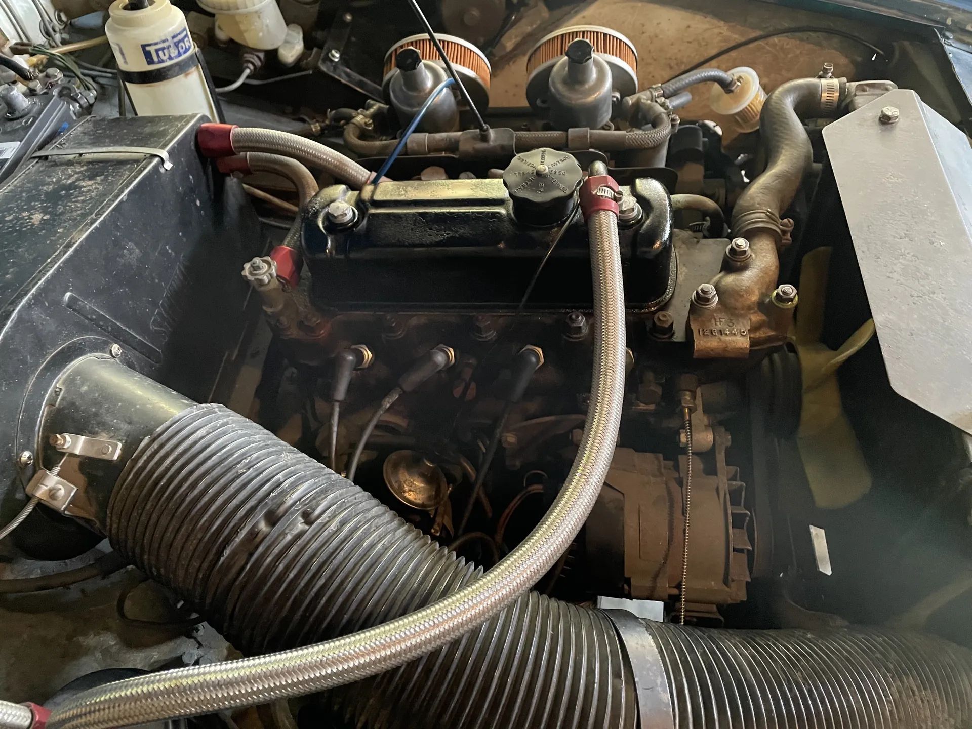 Engine compartment of 1973 MG Midget with 1275cc engine
