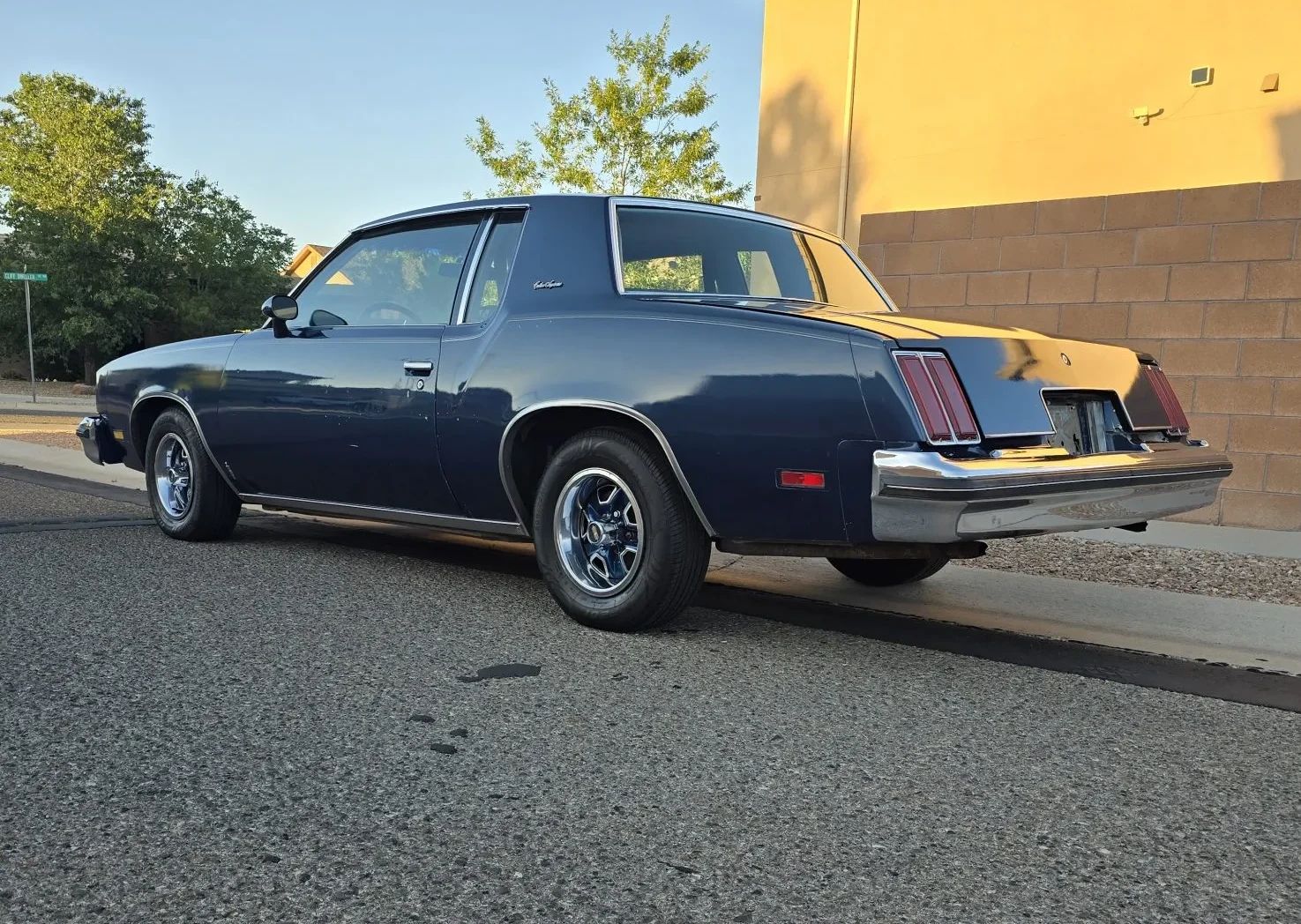 Driver rear 3q view of dark blue 1979 Oldsmobile Cutlass Supreme