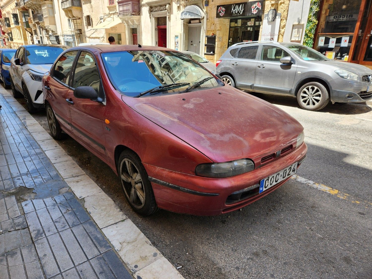Classic Cars of Malta: Automotive Melting Pot - Ford, Morris, Suzuki, Skoda, etc 31 Fiat Brava street parked.