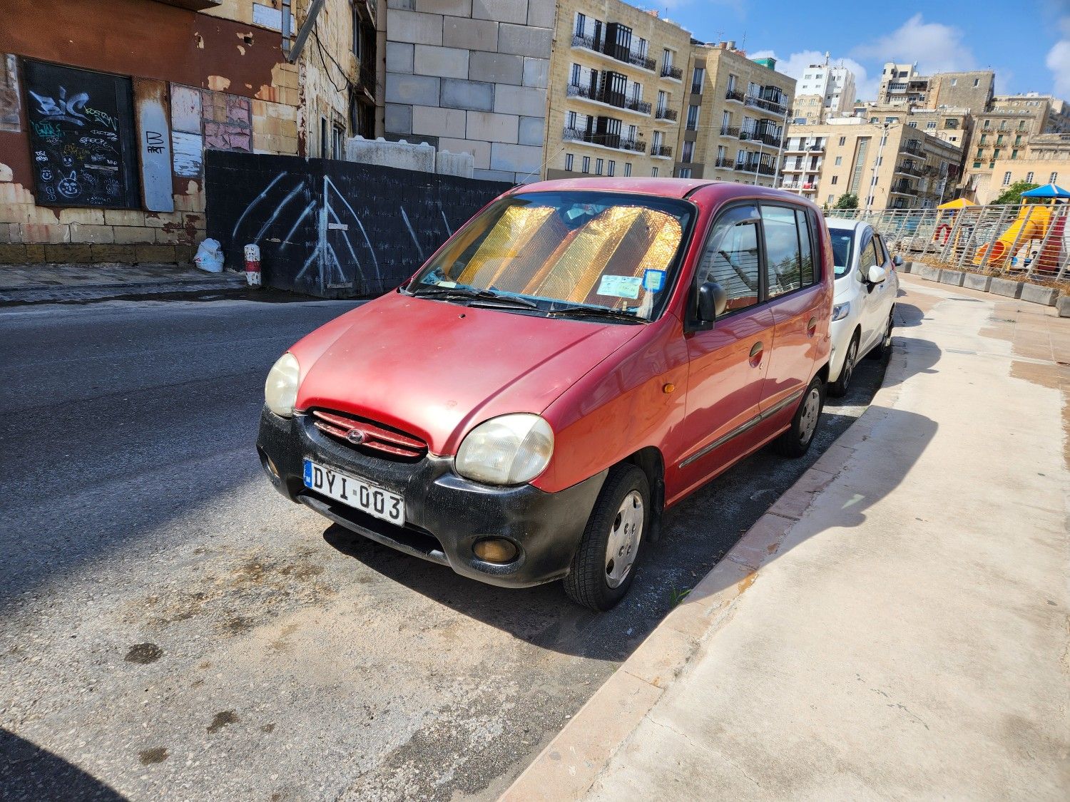 Classic Cars of Malta: Automotive Melting Pot - Ford, Morris, Suzuki, Skoda, etc 20 Street parked Hyundai Atos.