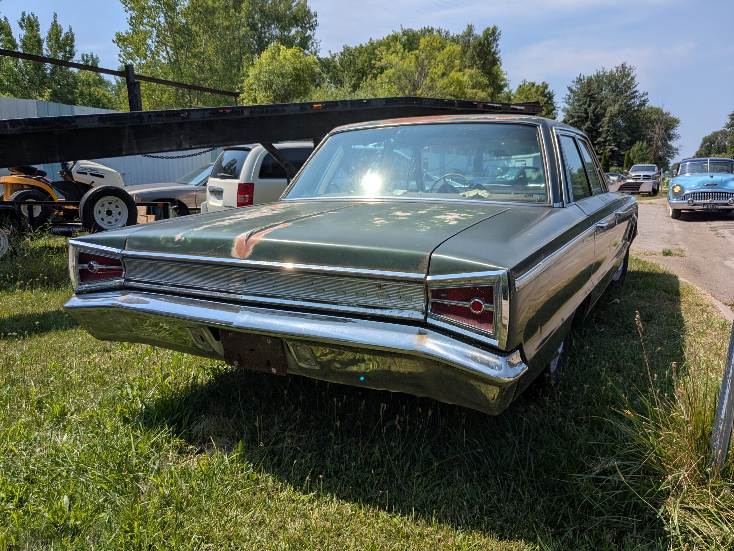 1965 Dodge Custom 880: Sometimes A Basic Sedan Makes For The Best Curbside Classic 5 Passenger rear 3q view of dark green 1965 Dodge Custom 880
