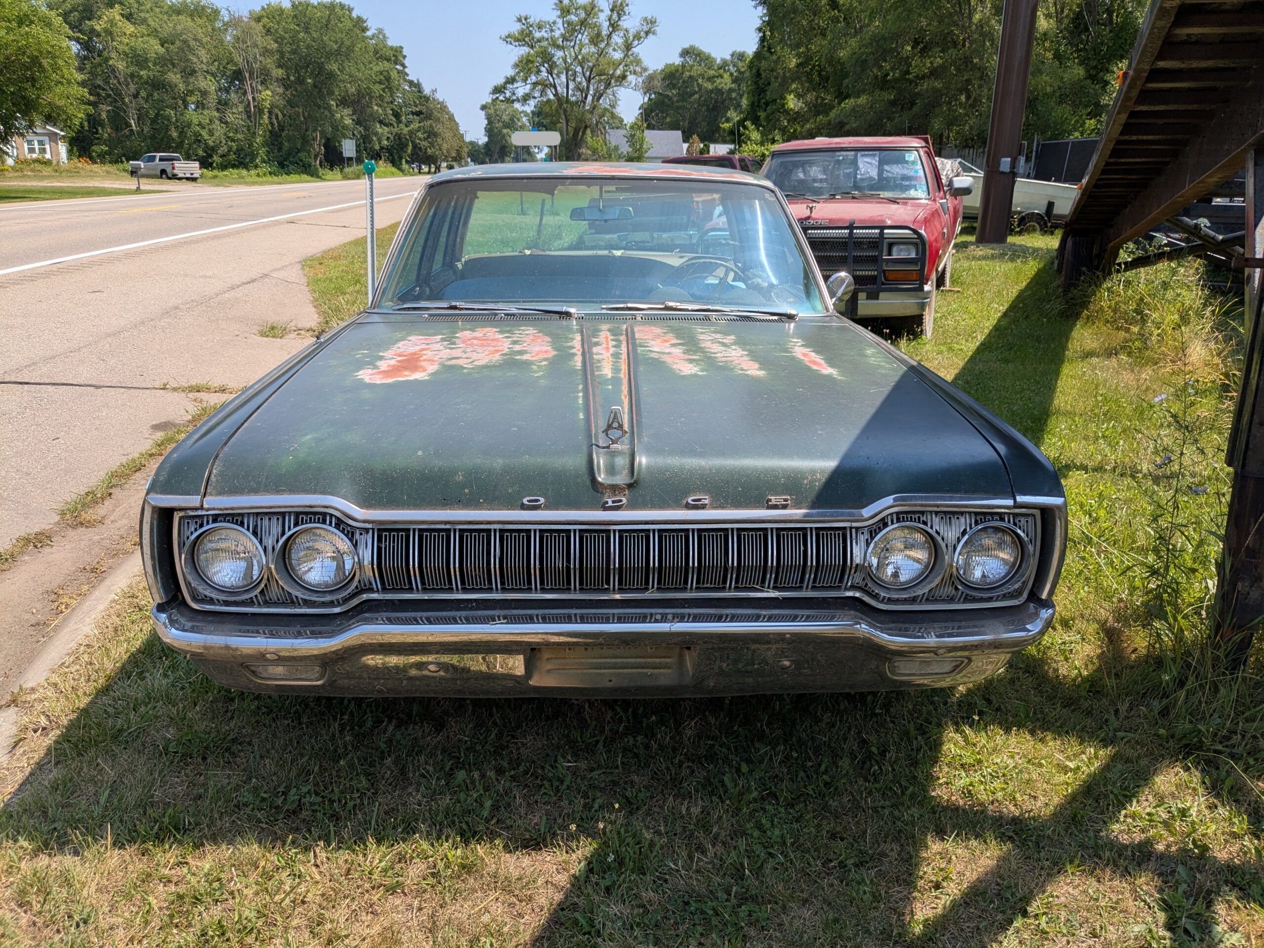 1965 Dodge Custom 880: Sometimes A Basic Sedan Makes For The Best Curbside Classic 2 Front view of dark green 1965 Dodge Custom 880 Sedan