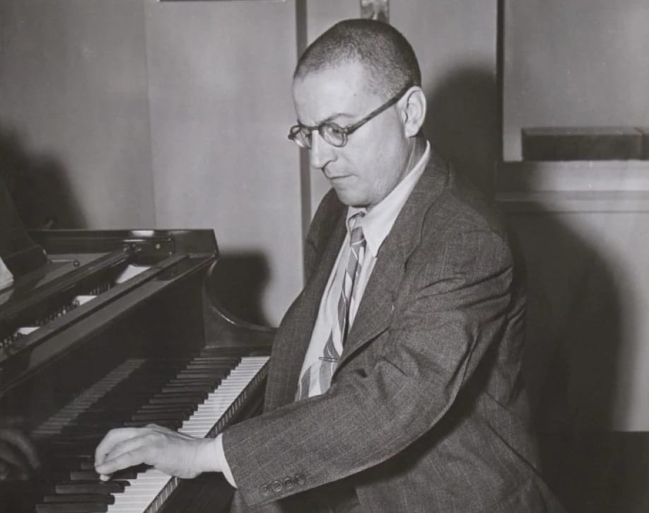 1970 Cadillac Fleetwood Sixty Special: A Chauffeur-Driven Example Of The Rare Final RWD Sixty Special 6 Photo of a white German man with glasses, playing the piano with his left hand