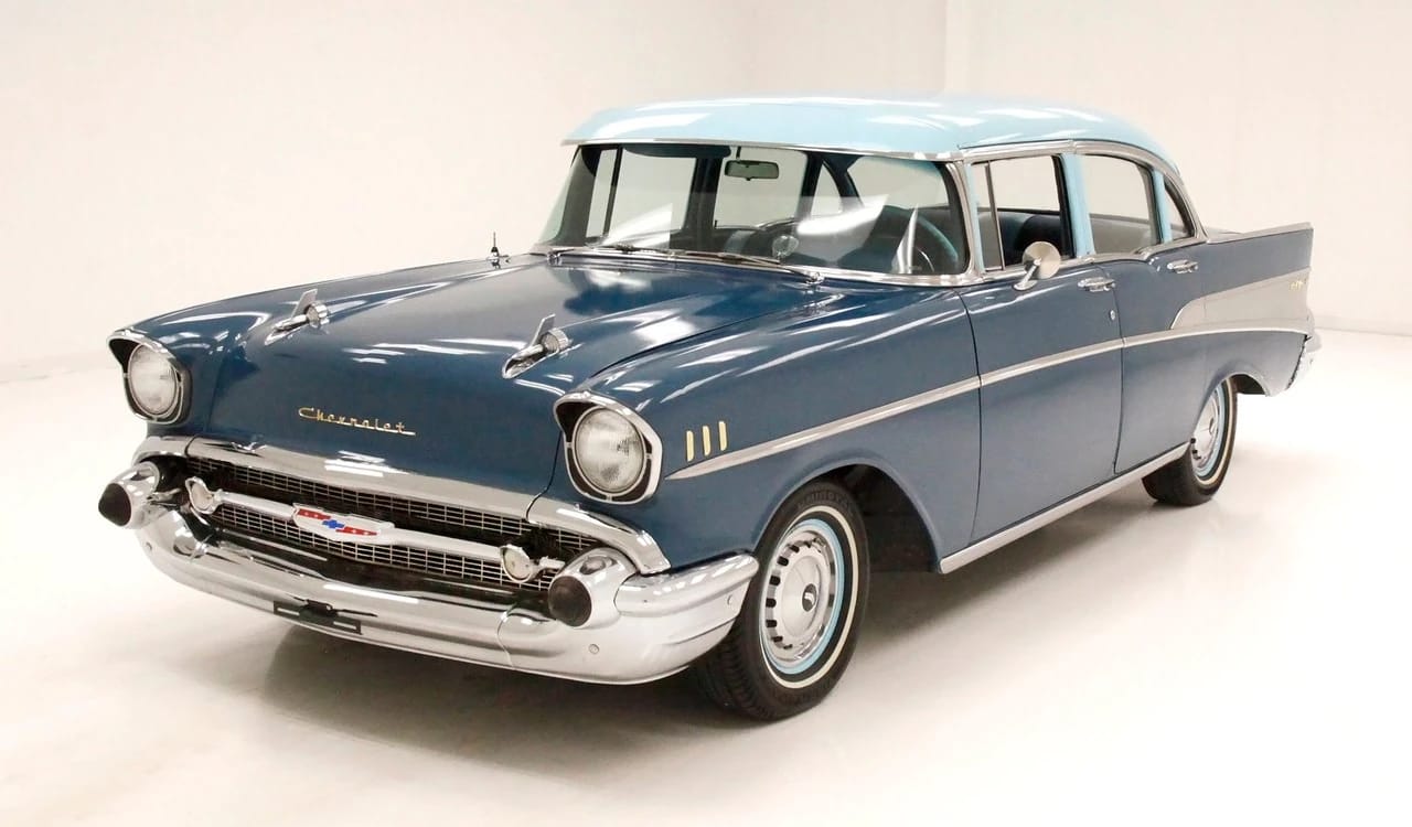 The 1957–1959 Ford-Chevrolet Sales Race: Busting Some Myths About When Ford Finally Beat Chevrolet — Twice 18 Left front 3q view of a two-tone 1957 Chevrolet four-door sedan in an indoor studio space