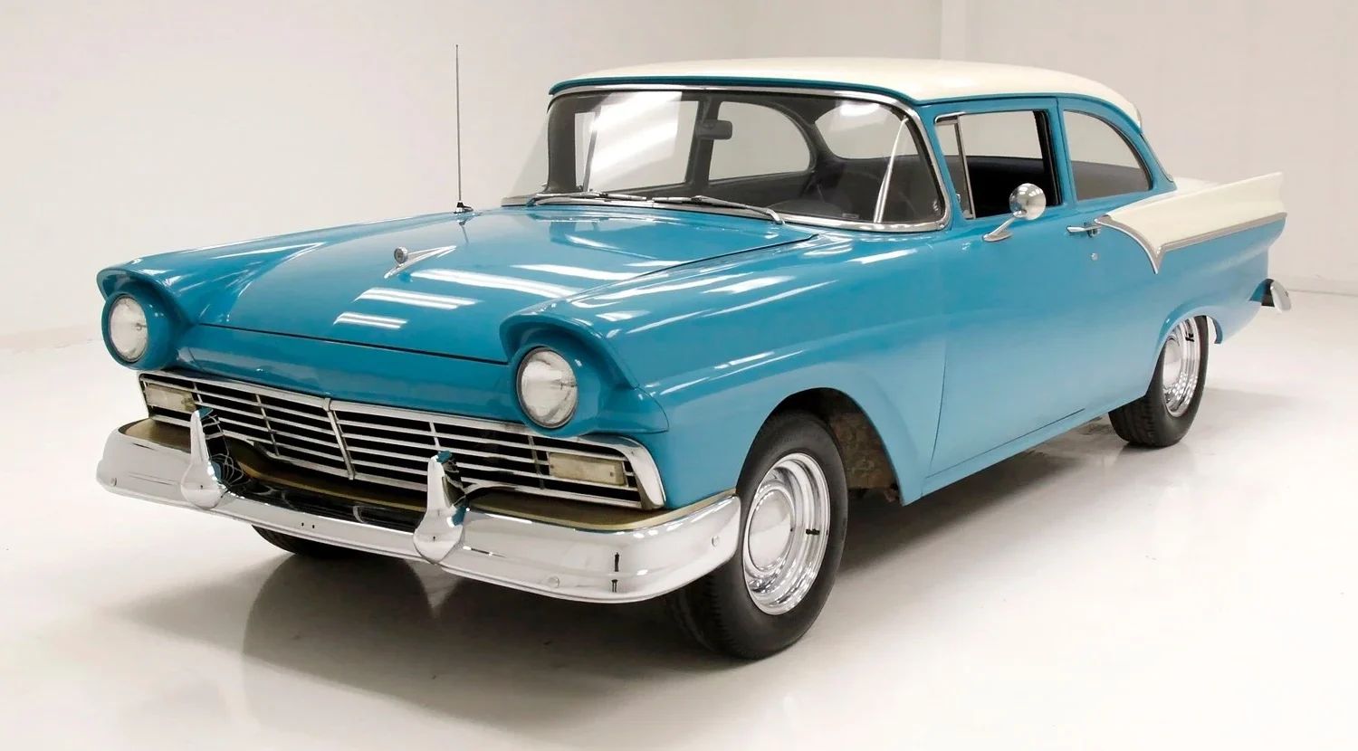 The 1957–1959 Ford-Chevrolet Sales Race: Busting Some Myths About When Ford Finally Beat Chevrolet — Twice 8 Left front 3q view of a two-tone 1957 Ford two-door sedan in an indoor studio space