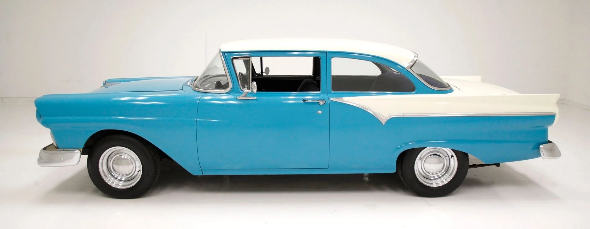 The 1957–1959 Ford-Chevrolet Sales Race: Busting Some Myths About When Ford Finally Beat Chevrolet — Twice 5 Left side view of a two-tone 1957 Ford two-door sedan