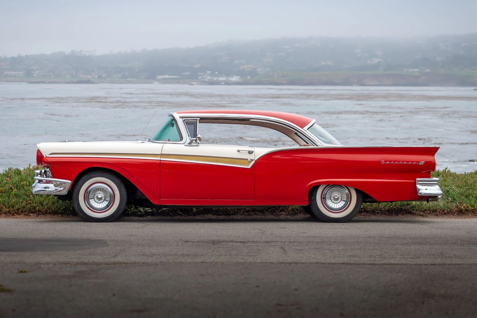 The 1957–1959 Ford-Chevrolet Sales Race: Busting Some Myths About When Ford Finally Beat Chevrolet — Twice 7 Left side view of a two-tone 1957 Ford two-door hardtop photographed next to the Pacific Ocean