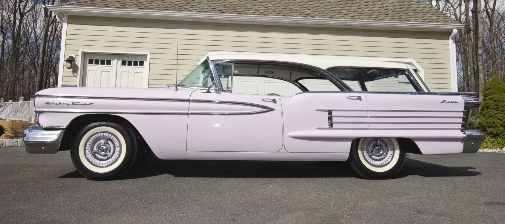 1958 Oldsmobile Dynamic 88 Fiesta Wagon: Looks Like A Fancy Cake, But Less Roomy Than A Country Squire 6 Left side view of a a two-tone 1958 Oldsmobile four-door hardtop station wagon