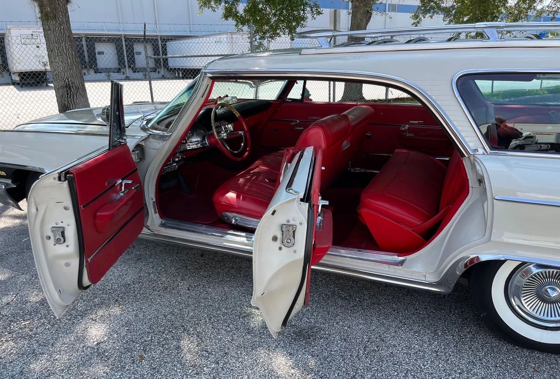 1962 Chrysler New Yorker Town & Country: 1962's Most Expensive Luxury Wagon Was A 1961 Plymouth In Disguise 17 Left side of a 1962 Chrysler four-door hardtop station wagon with all the doors open