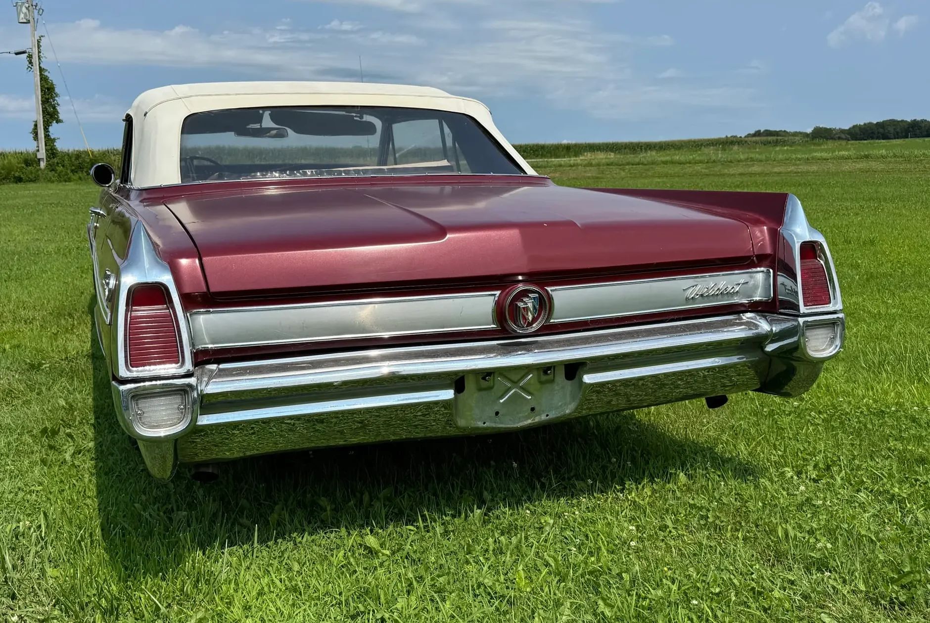Rear view of a 1963 Buick convertible with the top up