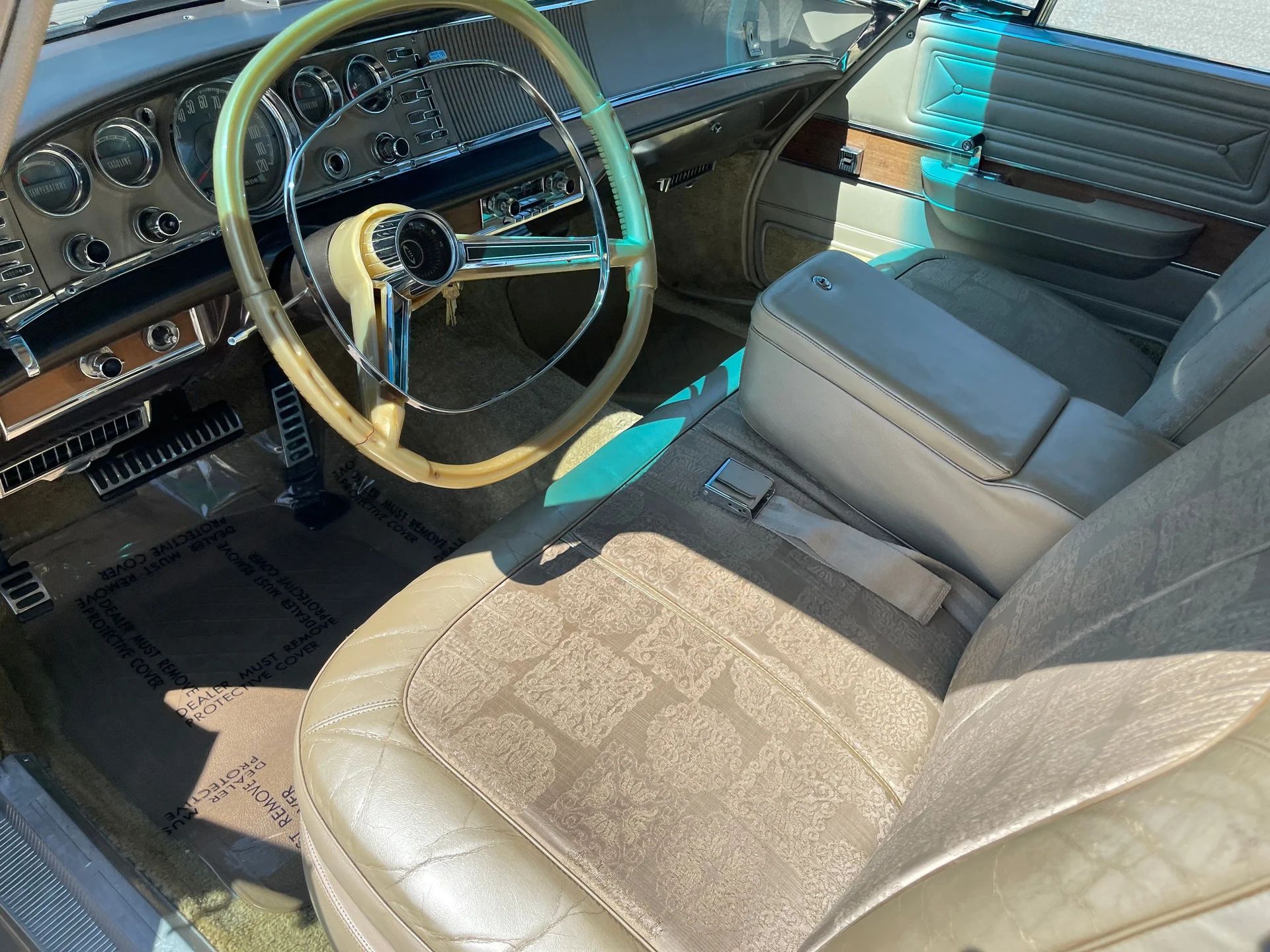 Driver's seat and dashboard of a 1964 Chrysler