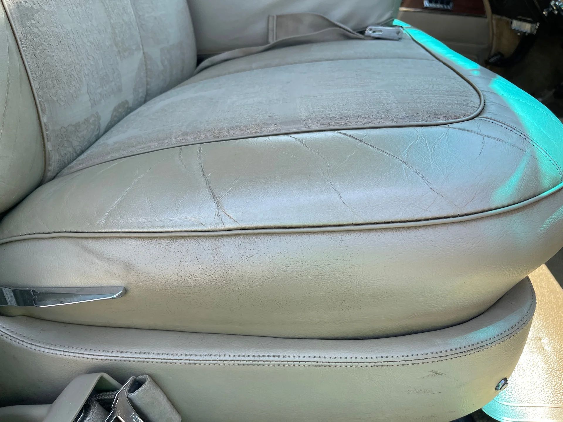Closeup of the right side of the front seat of a 1964 Chrysler