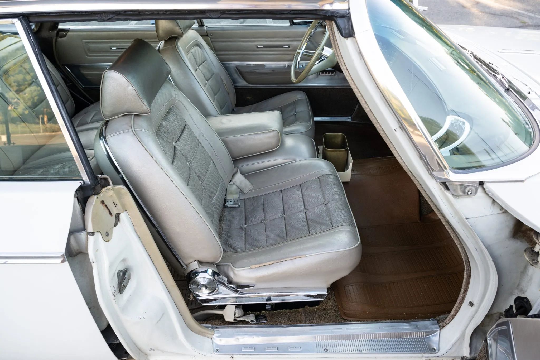 1965 Chrysler New Yorker: Bucket Seats Return To This Full-Size Luxury Two-Door Hardtop 6 Front bucket seats in a 1964 Chrysler wagon, seen through the right front door