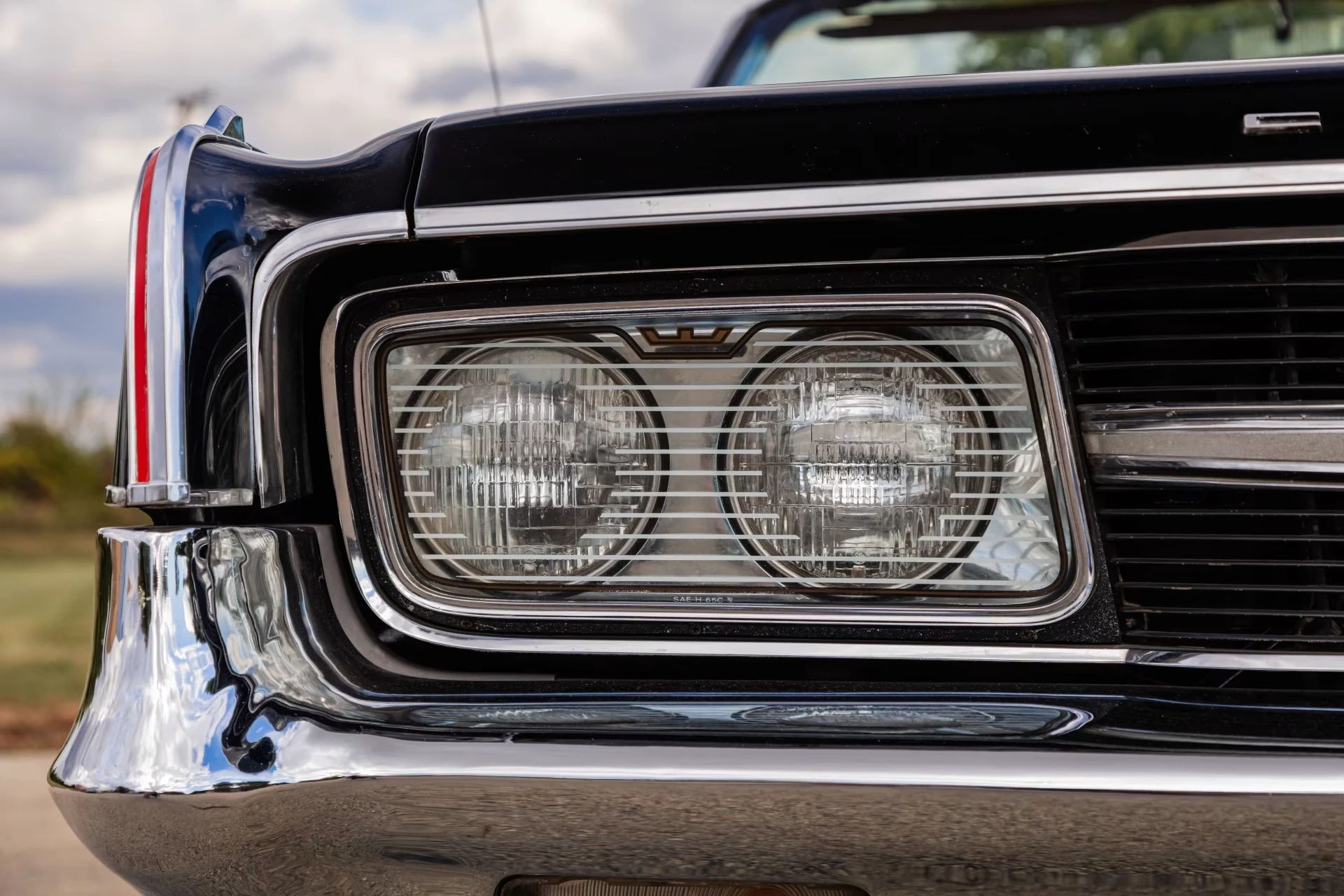 1965 Chrysler 300-L Convertible: Ultra-Rare 4-Speed Manual Transmission In The Last And Least Of The Letter Cars 21 Headlight cover on the right side of a 1965 Chrysler