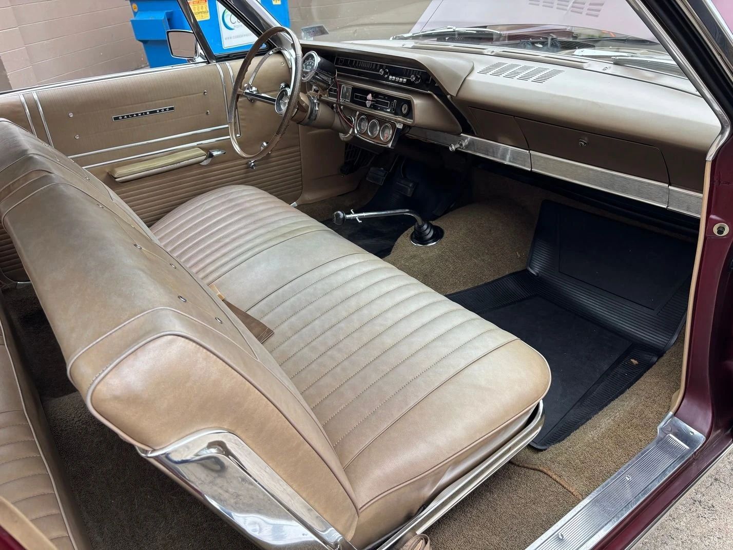 1965 Ford Galaxie 500 Fastback: Bench Seat And Rare 4-Speed With A Z-Code 390 8 Right side of the dash and front seat of a 1965 Ford with a bench seat and a floor shift