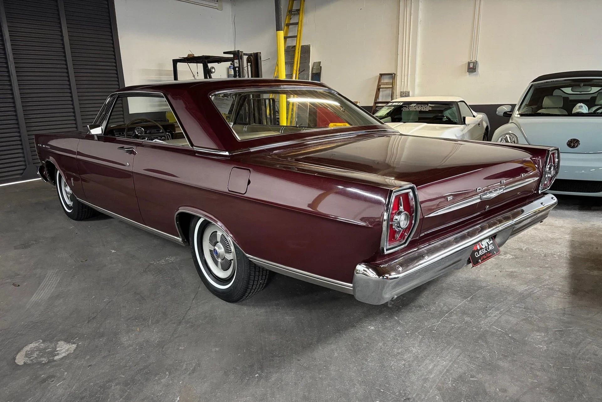 1965 Ford Galaxie 500 Fastback: Bench Seat And Rare 4-Speed With A Z-Code 390 15 Left rear 3q view of a 1965 Ford full-size two-door hardtop in an indoor garage space