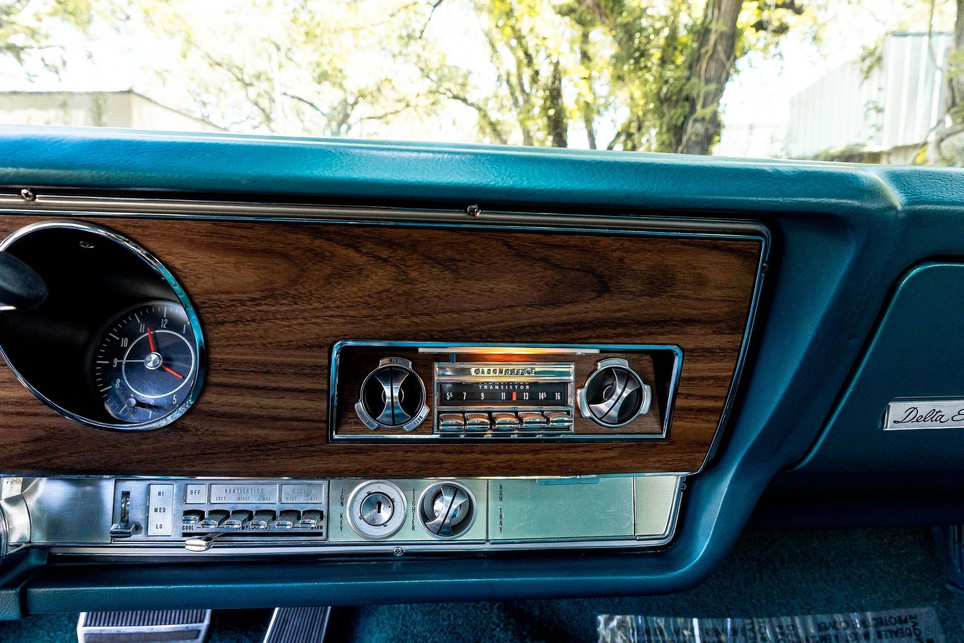 1968 Oldsmobile Delta 88 Holiday Sedan: A Cool Blue Olds "Youngmobile" In Ocean Turquoise 13 Radio and heater controls in the dashboard of a 1968 Oldsmobile